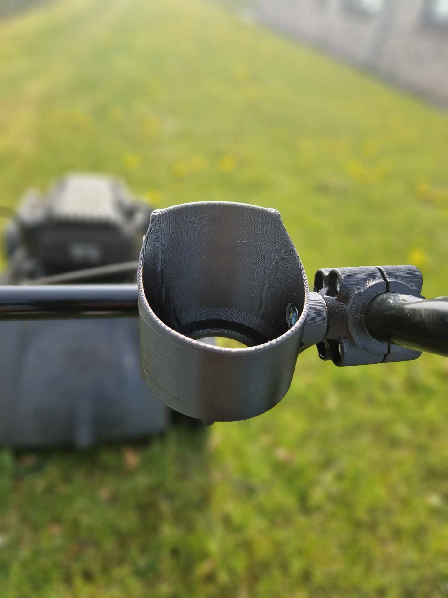 Dåse holder til plæneklipper