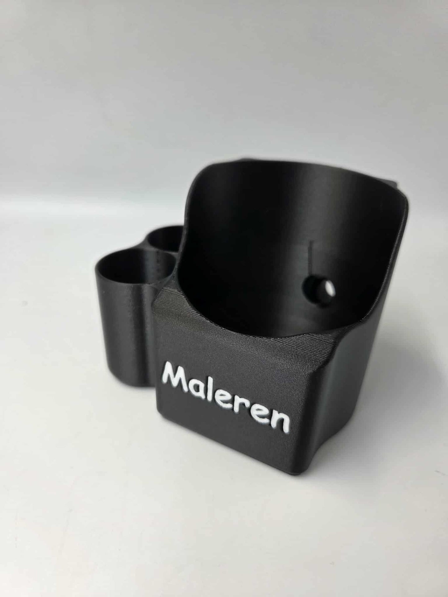 Universal kopholder med plads til underberg