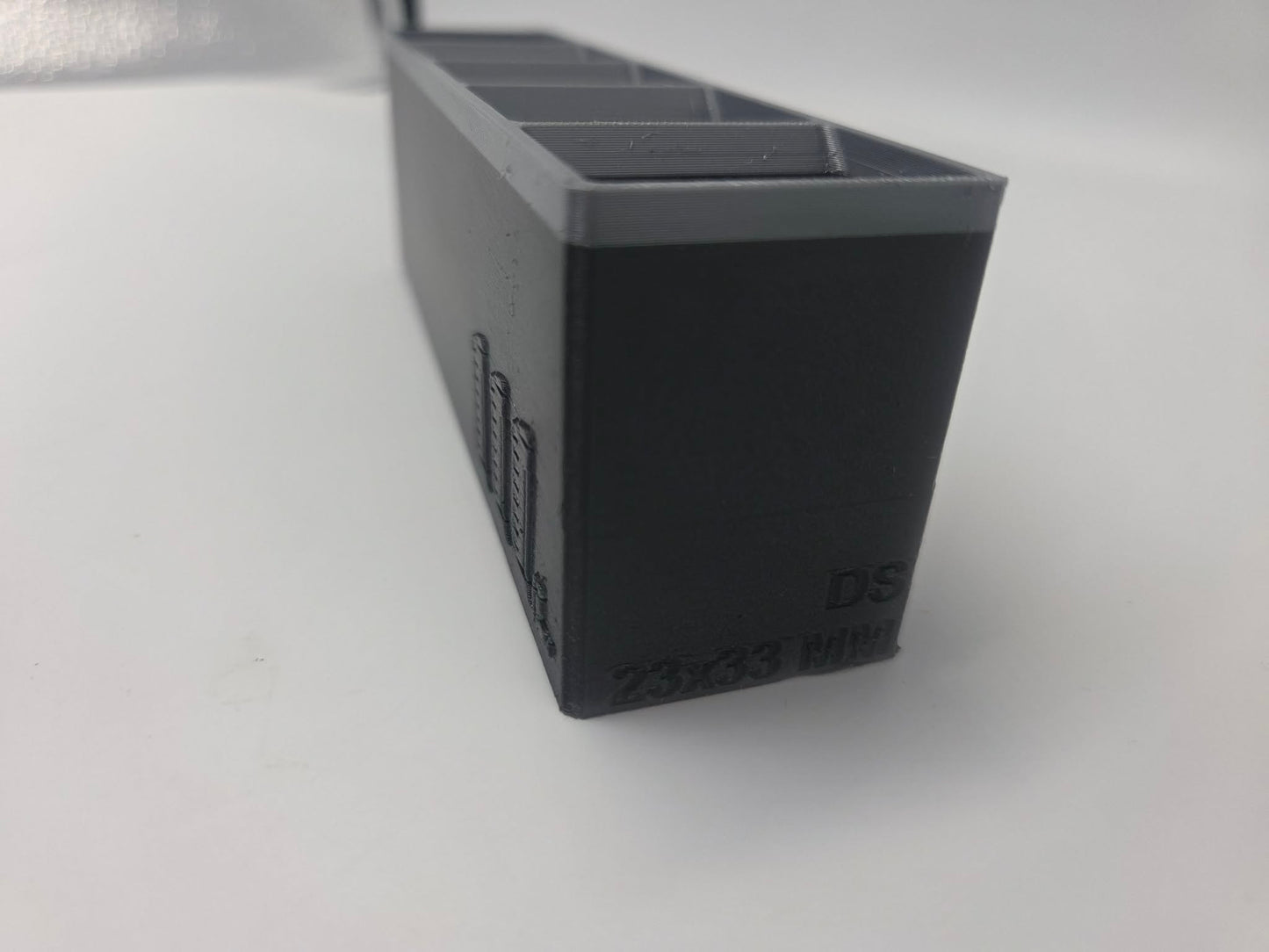 2. sortering – magasinholder (23 × 33 mm)