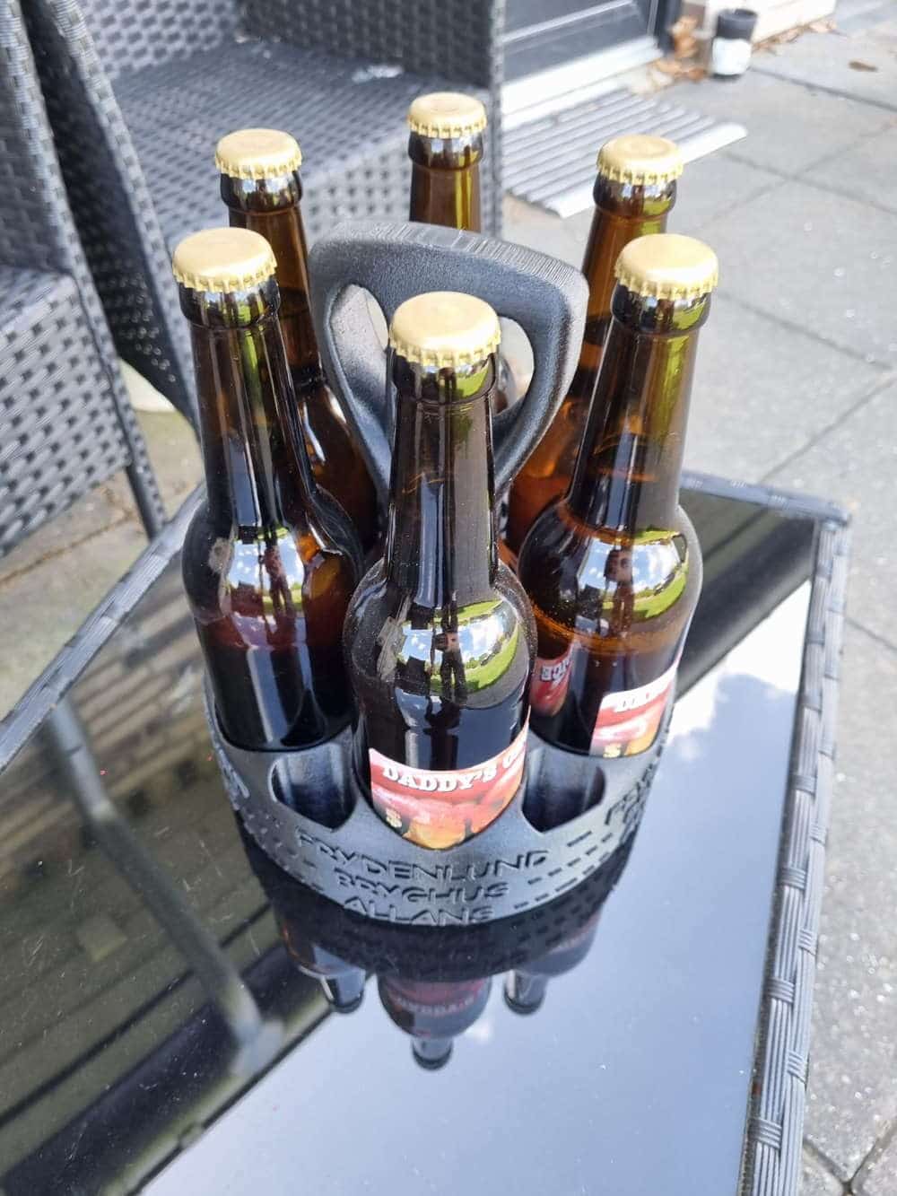Holder til 6 stk 0.5 liters glas flasker
