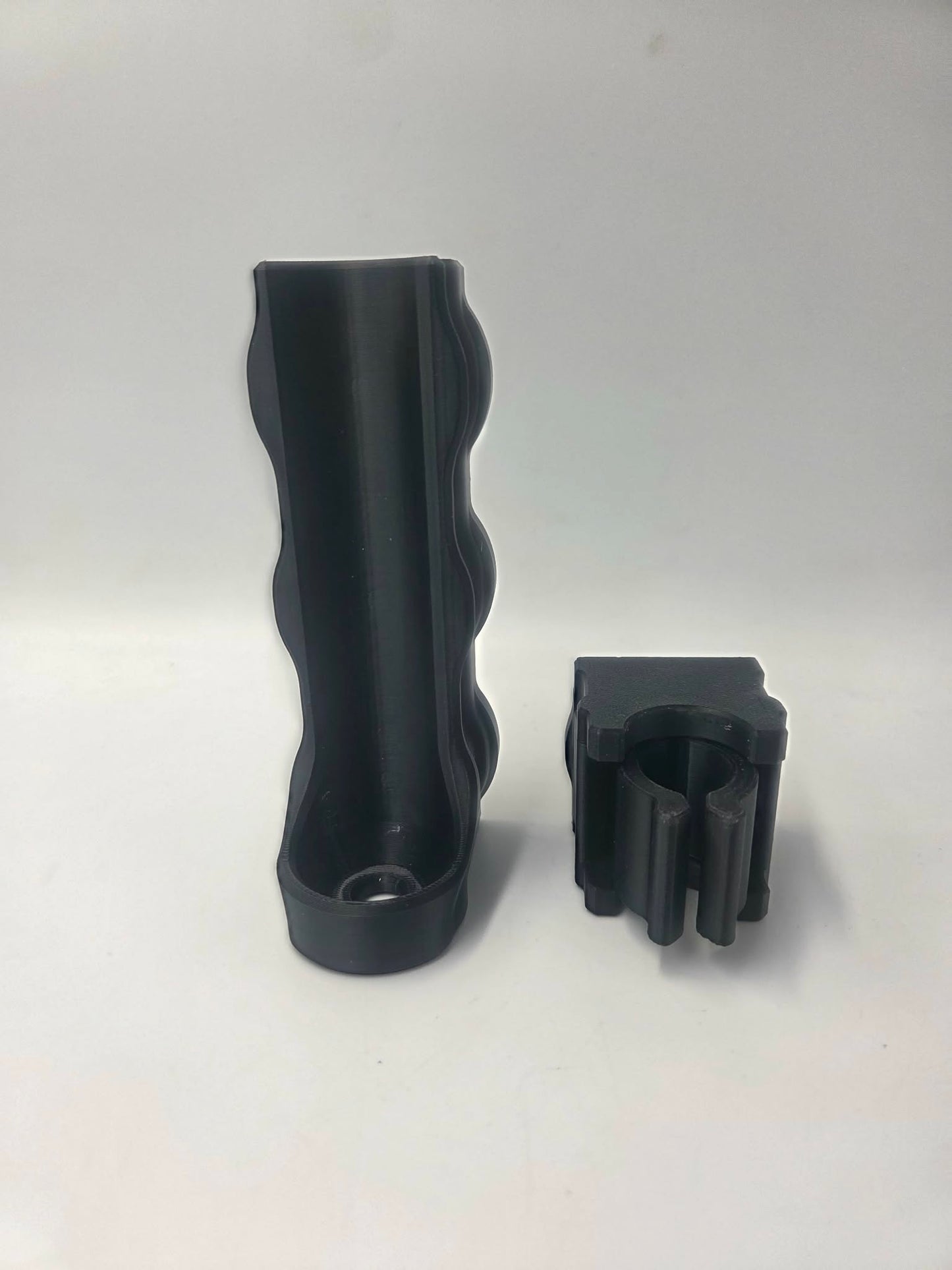 Riffelrørsholder til våbenskab - Universal med fjedertop