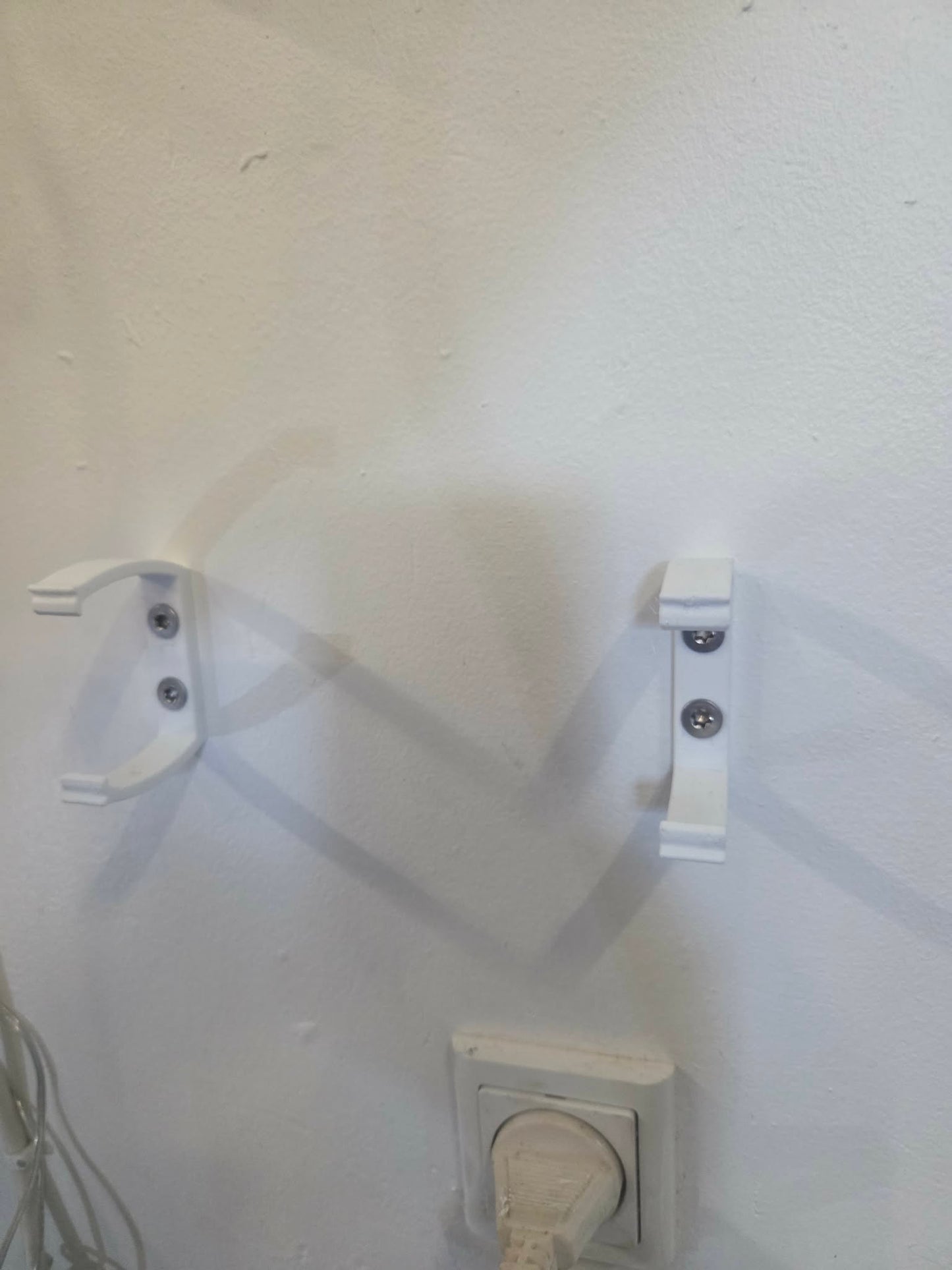 Holder til stikdåse