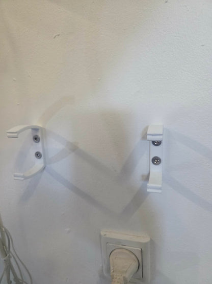 Holder til stikdåse